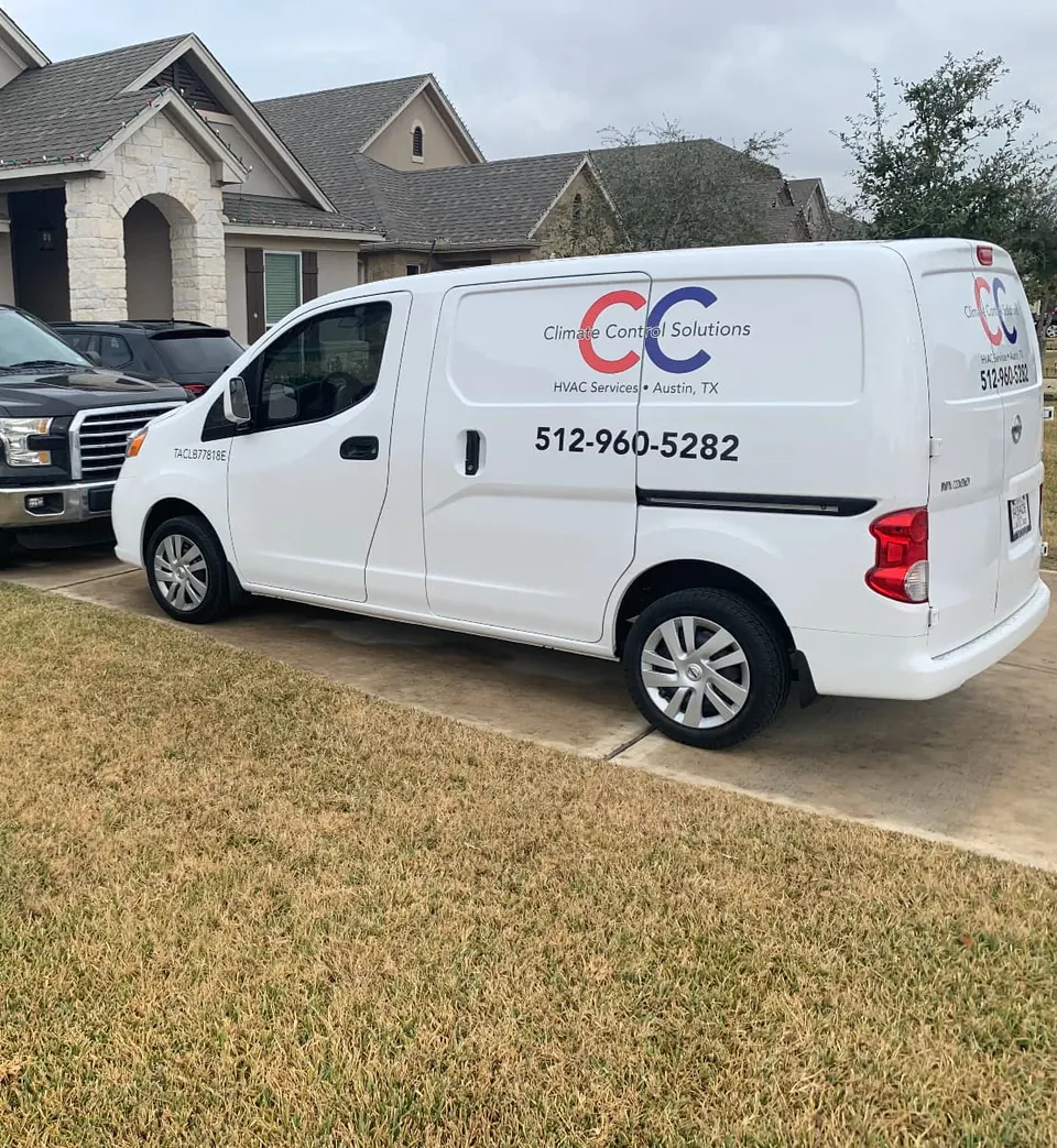Climate Control Solutions service van parked outside a home in the Kyle area